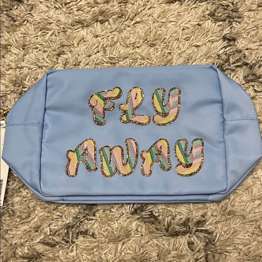 Stoney Clover Lane large pouch. “Fly Away” periwinkle. Blue. New with tags.